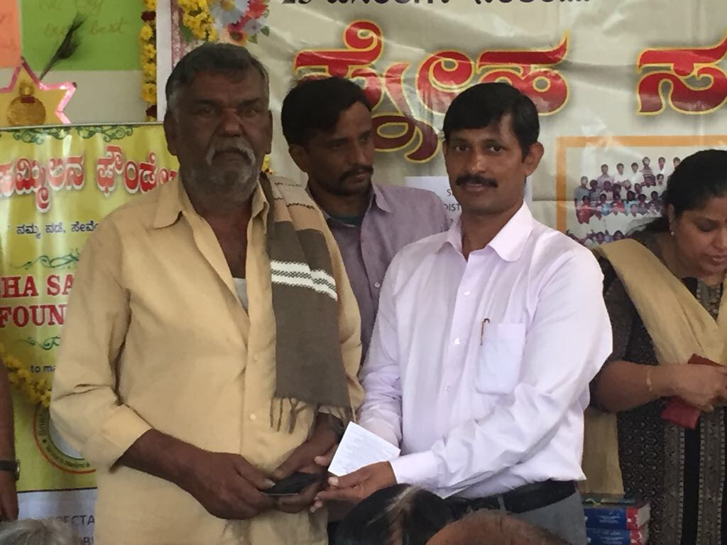 Distribution of Spectacles to the Eye camp Patients photo 8
