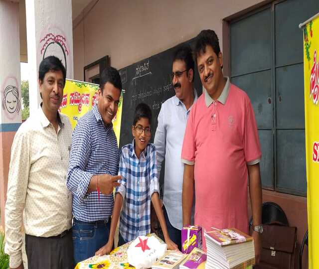 Distribution of 100 Exam Pads and 200 Pen Set at Jayabharathi high School, Attibele photo 2