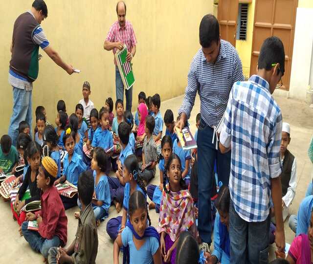 Distribution of 100 Exam Pads and 200 Pen Set at Jayabharathi high School, Attibele photo 3