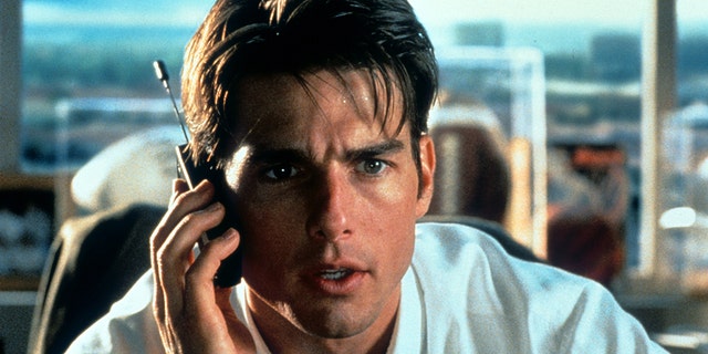 Tom Cruise talks on a phone in a scene from the film 'Jerry Maguire.' (Getty Images)