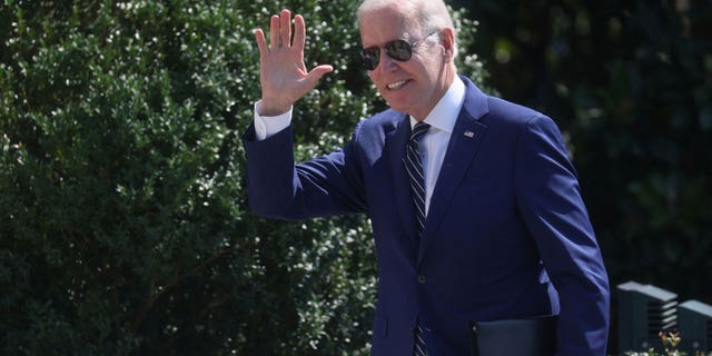U.S. President Joe Biden greets people on South Lawn after arriving on Marine One from a trip to Delaware at the White House in Washington, U.S., August 24, 2022.