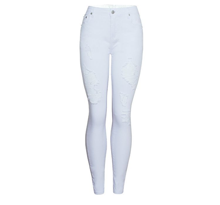 Tight white cigarette pants with rips