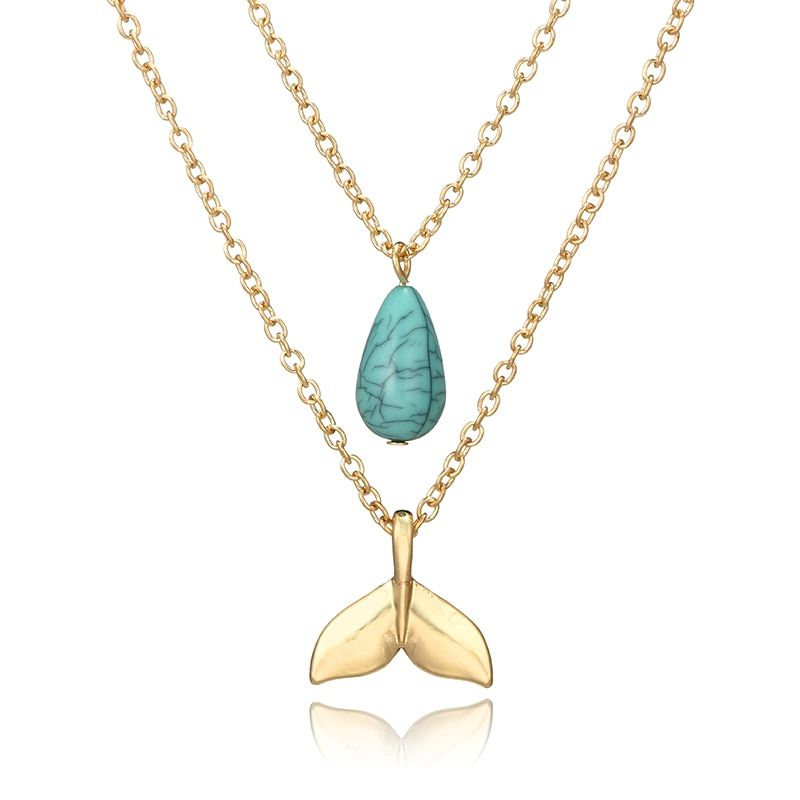 Multi-layered whale tail and mermaid necklace
