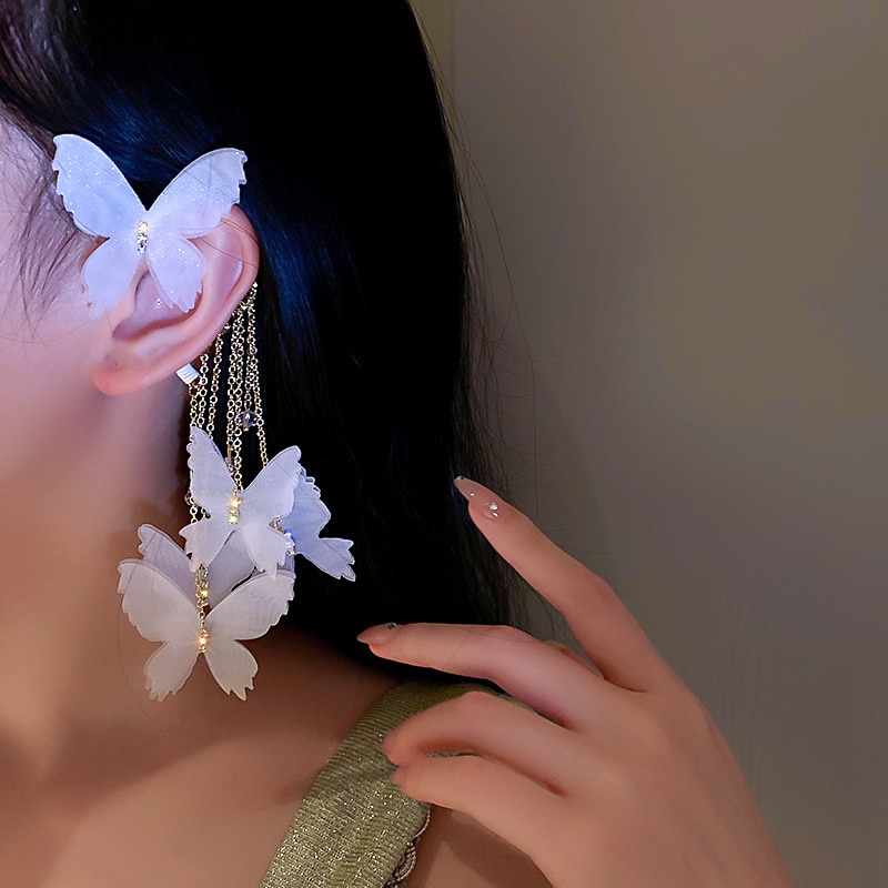 Boucle d'oreille papillon, perle et fleur