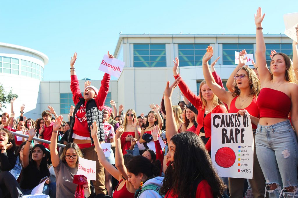Students at the February 10 walkout raise their hands in response to statements about rape culture at Berkeley High School: “Keep your hand up if you are ready to personally commit to changing this culture.”