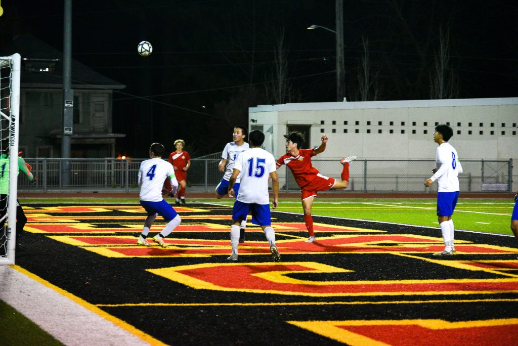 BHS varsity soccer player Ko Wiedlin, pictured right, scored the first goal on February 9.