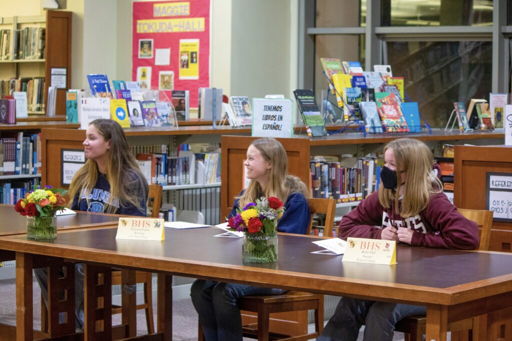 Pictured left to right at the November 9 signing: Isabel Bessette, Melinda Pullin, and Ruby Hill.