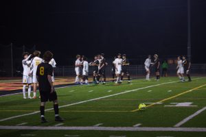 Senior Oliver Gill winds up for a dangerous free kick.