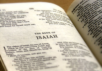Photo of the Book of Isaiah page of the Bible ...