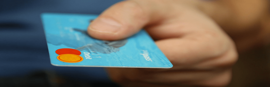 hand and credit card image
