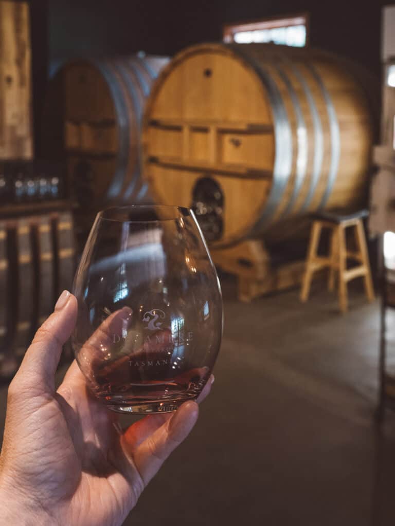 Tasting Pinot Noir at Delamere Vineyards while visiting Tamar Valley Wineries
