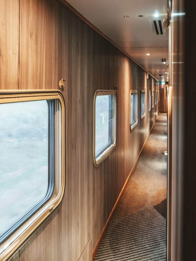 Looking down the hallway of the Ghan Platinum class carriage