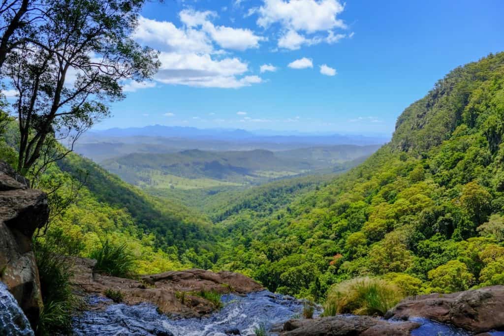 Views out over the coomera valley from on top of a waterfall in Lamington national Park