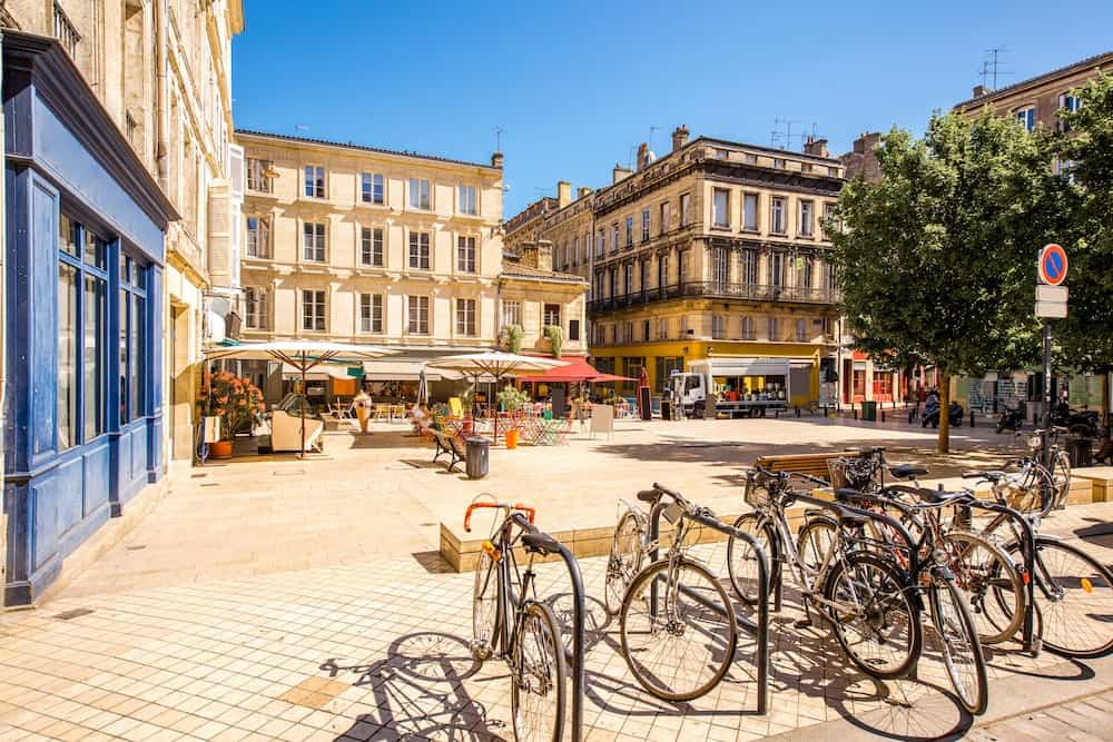 View on the small square with bicycles in Bordeaux city in France