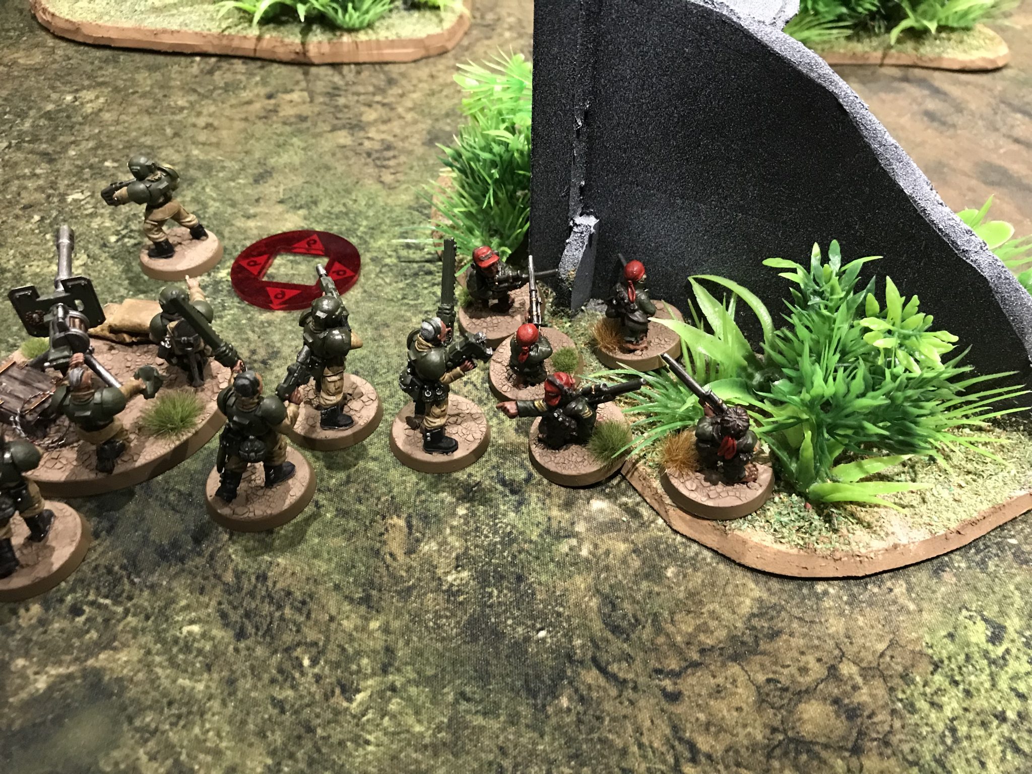 Ratlings and Guardsmen hold in the bushes