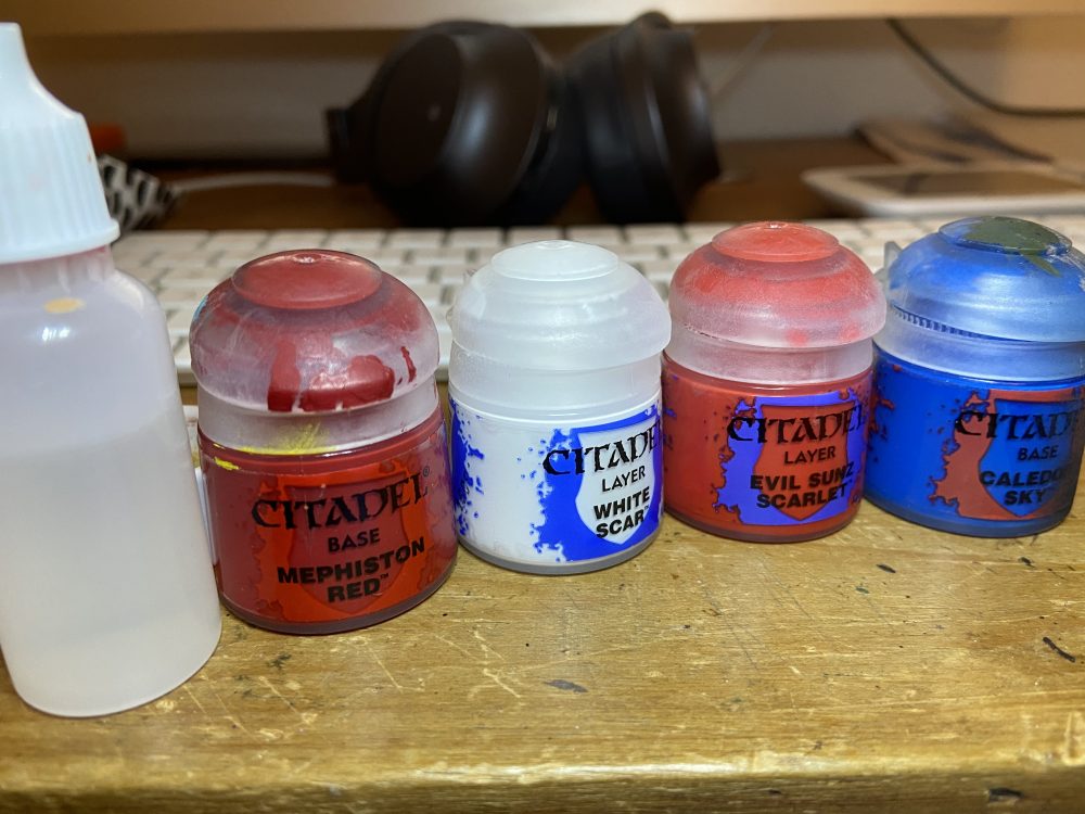 The cloak was done with these four paints - and water