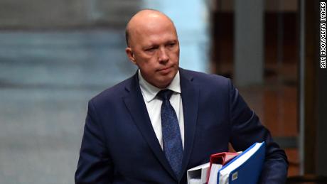 Australia's Home Affairs minister Peter Dutton was threatened with contempt of court over a visa case.