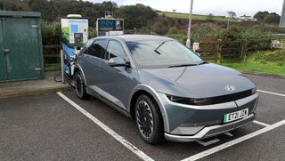 hyundai ioniq 5 ev recharging at geniepoint charger in countryside