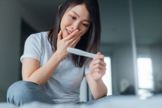 How to get pregnant: Woman receiving results of pregnancy