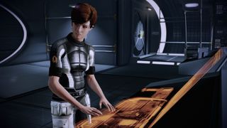 Kelly Chambers at her console in Mass Effect 2 Legendary Edition