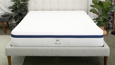 The Helix Midnight mattress reviewed on a gray fabric bed base