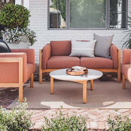 A studio photo of Haven Loveseat Sunbrella Canvas / Cushion Arm