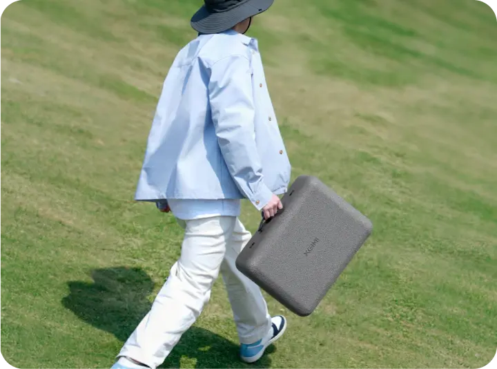 Easy to Load, Easy to Carry Compact and lightweight, it's as small as a 20-inch suitcase and fits effortlessly in your car trunk, making it easy to carry anywhere. 0.8 kg (Carrying case only) 4.9 kg (Projector and accessories included) *A 20-inch suitcase depicted in the image measures 375*235*570 mm. Easy to Load, Easy to Carry Compact and lightweight, it's as small as a 20-inch suitcase and fits effortlessly in your car trunk, making it easy to carry anywhere. 0.8 kg (Carrying case only) 4.9 kg (Projector and accessories included) *A 20-inch suitcase depicted in the image measures 375*235*570 mm.