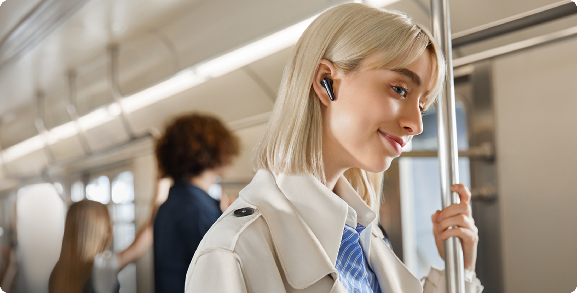 woman enjoying music with soundcore wireless earbuds in anytime