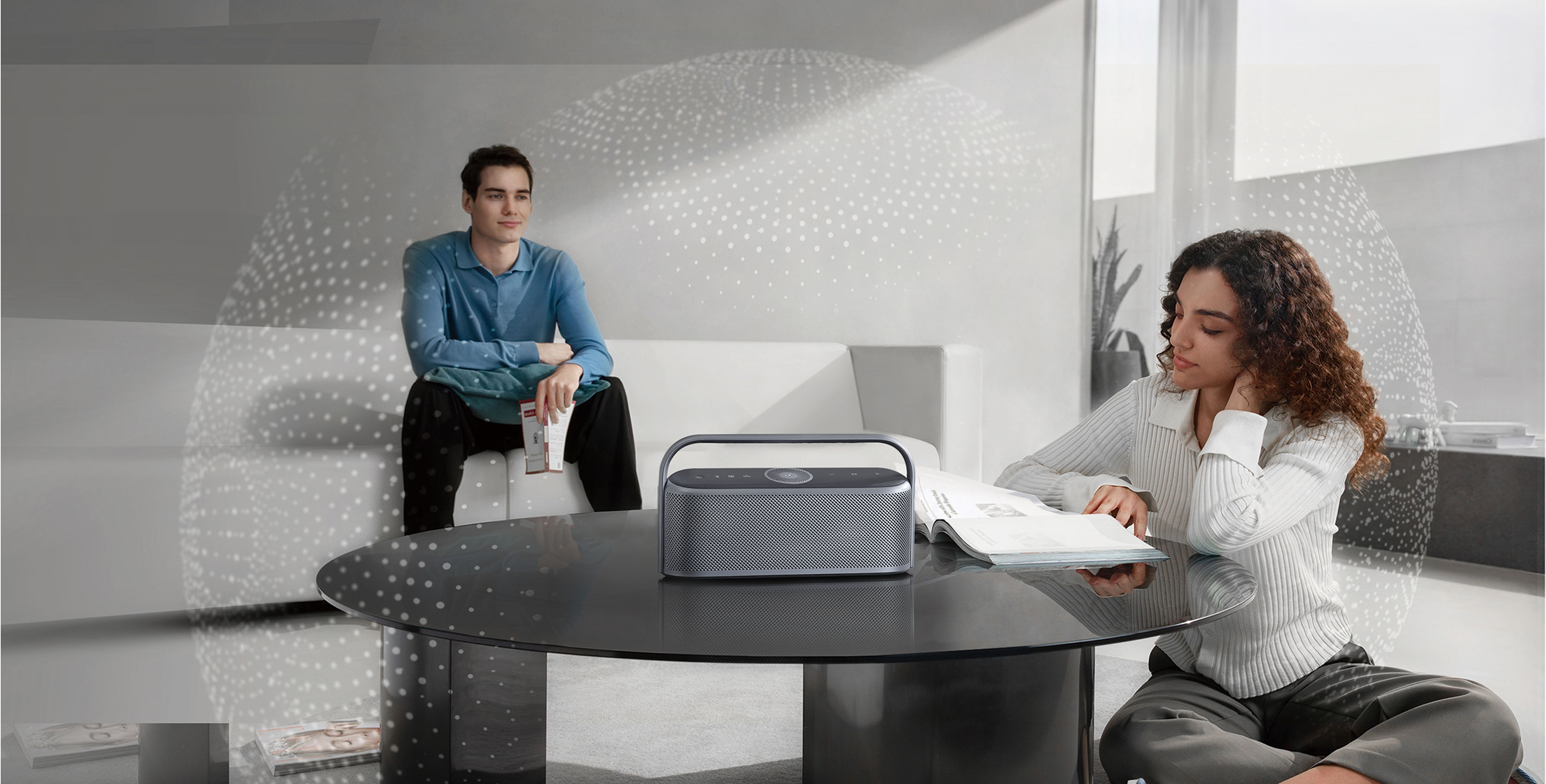 couple relaxing in a room with soundcore portable speaker