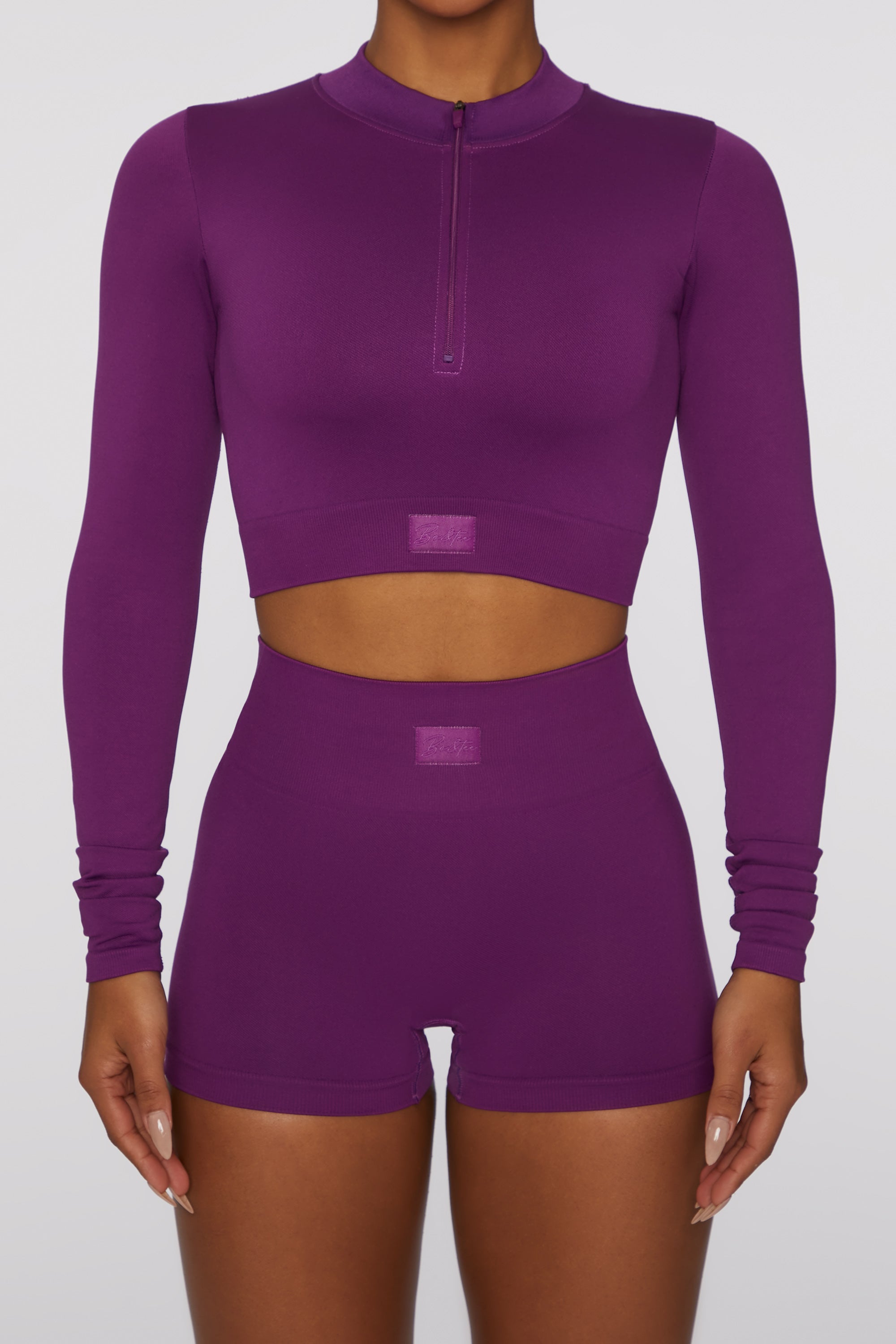 Reach For It Seamless Long Sleeve Zip Up Crop Top In Dark Purple Oh Polly