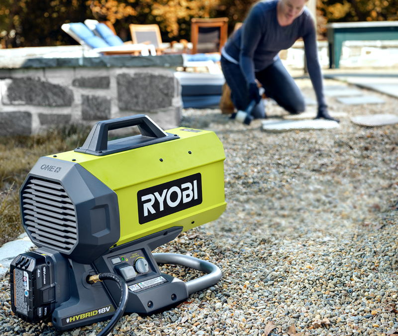 Girl working outside with RYOBI propane heater