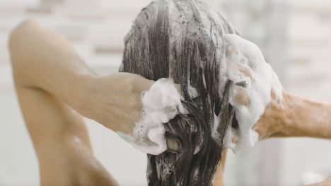 Woman washing her hair