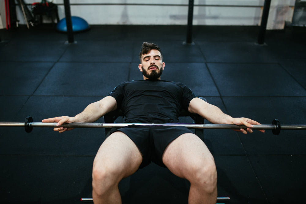 How To Do Barbell Glute Bridges Form Benefits Steel Supplements