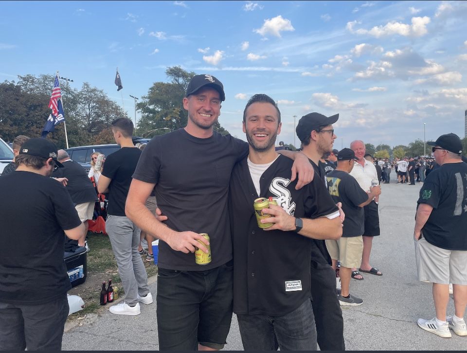 Patrick Elget (right) with his friend in a parking lot outside Guaranteed Rate Field.