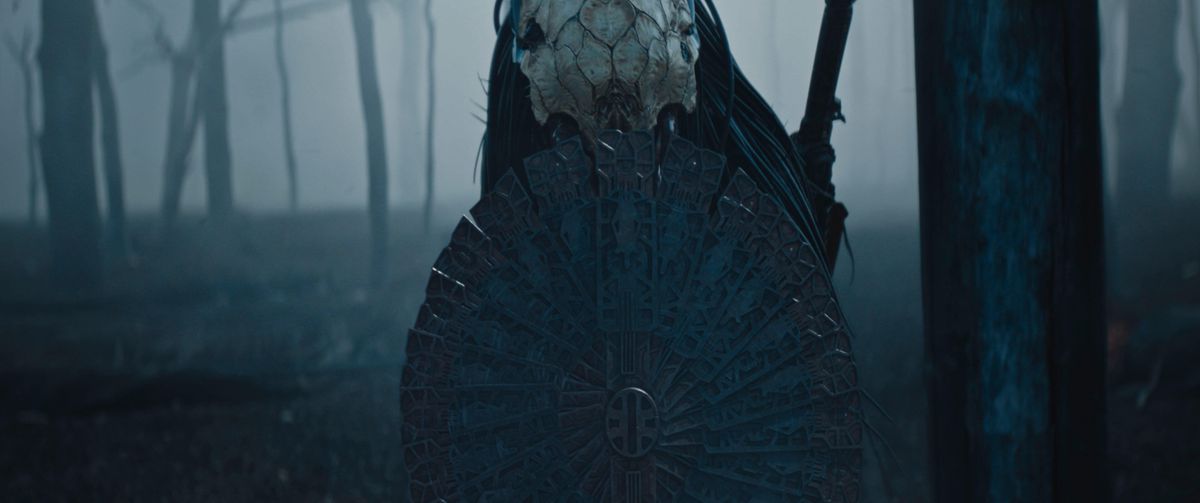 The Predator (Dane DiLiegro) activating a shield in Prey.