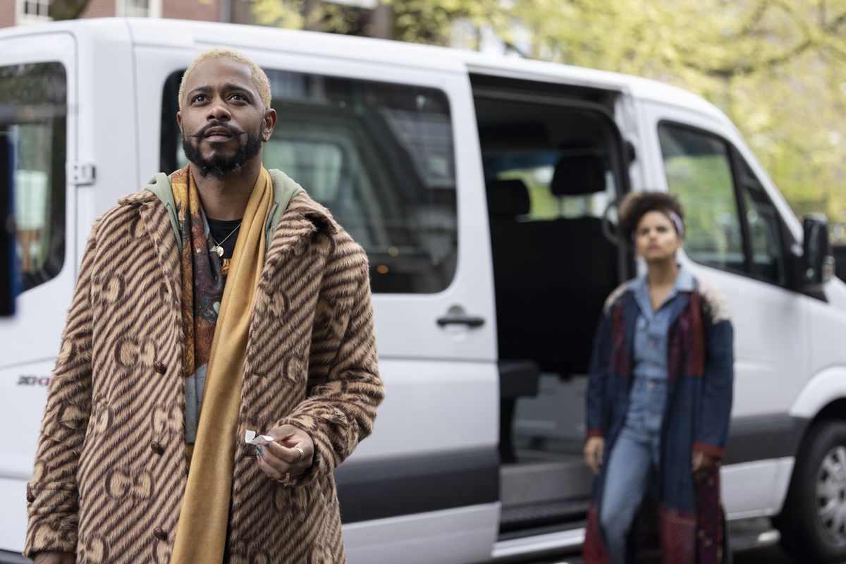 Darius and Van stand outside a van in Amsterdam in season 3 of FX’s Atlanta.