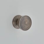 Colquhoun's Antique-Nickel-AN-copy-150x150 Pedestal Door Stop on Round Rose 4˝