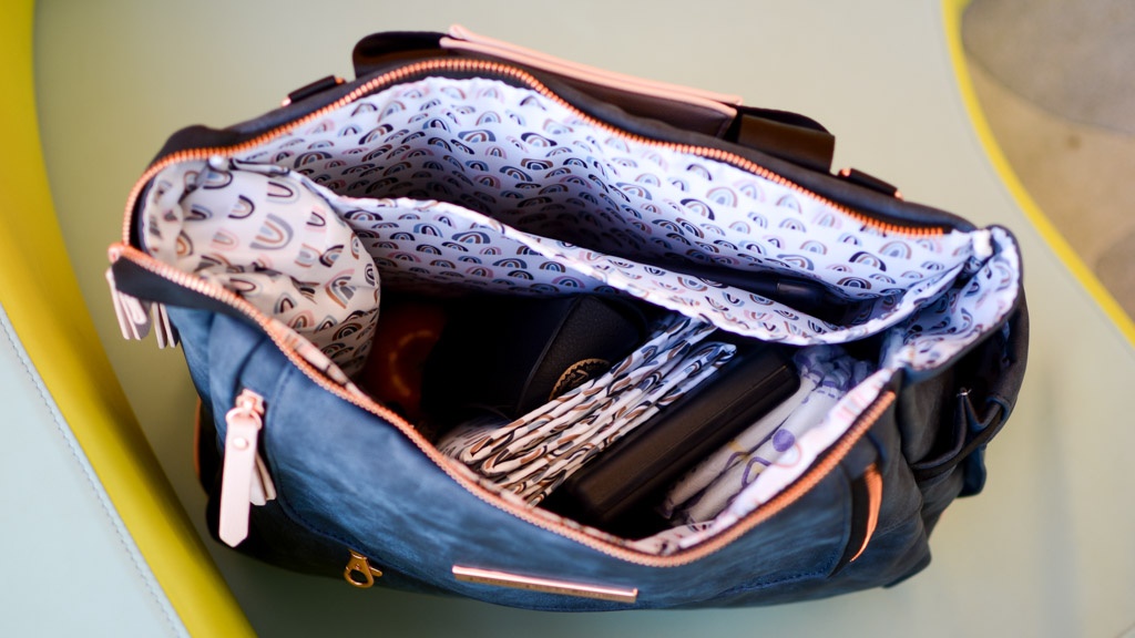 diaper bag - the material on the inside of the pivot is wipes down without a...