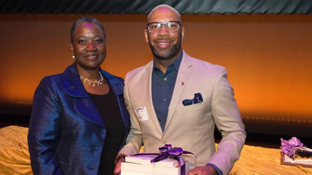 André Davis with Dean Wilson receiving an award during SPCS Night