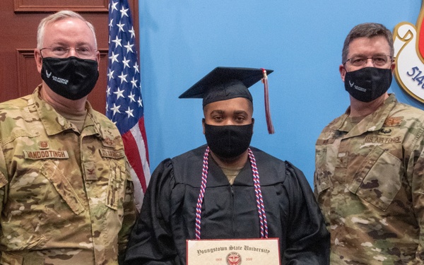 Task Force Liberty member receives diploma while deployed