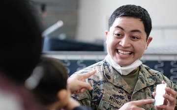 TF McCoy Marine Teaches Sign Language to Deaf Afghan Child