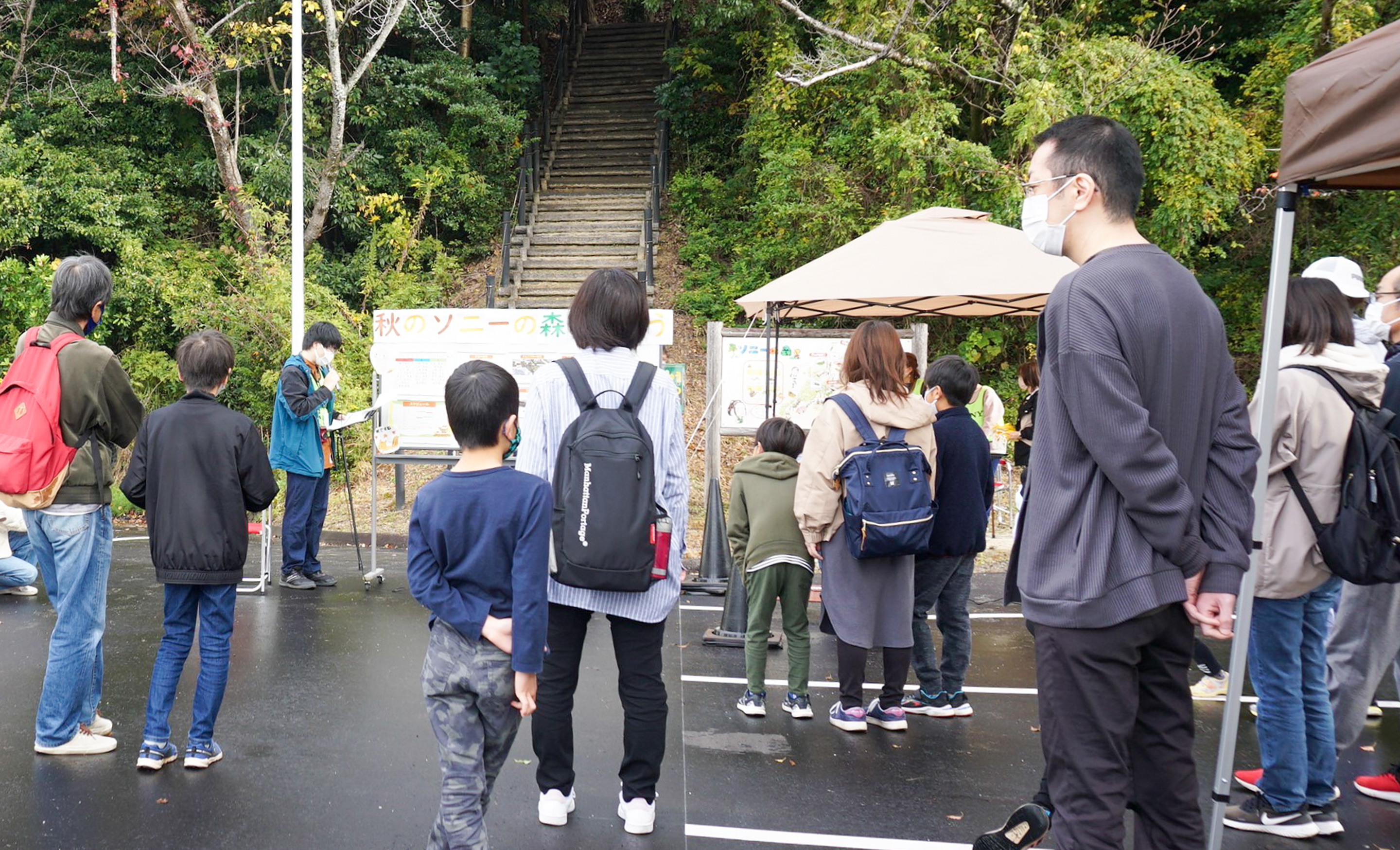 Photograph showing environmental awareness event held at a forest within Kohda site, Japan