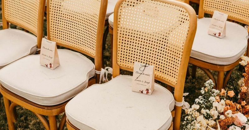 Bride leaves empty seat for late son but breaks down when she notices who's seated there