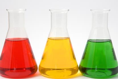 Beakers with red, yellow and green liquid