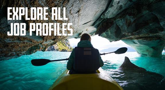 Canoist emerging from a cave