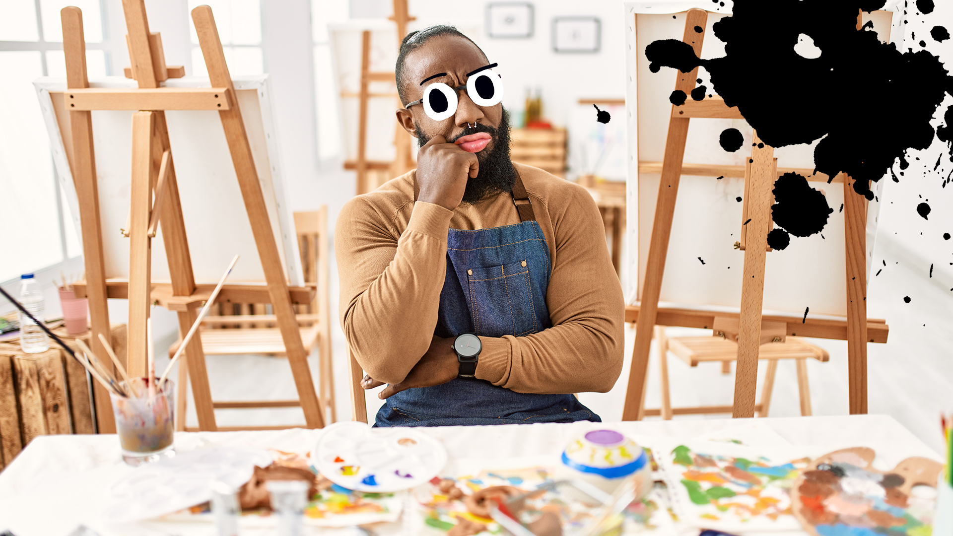 An artist in a bright studio