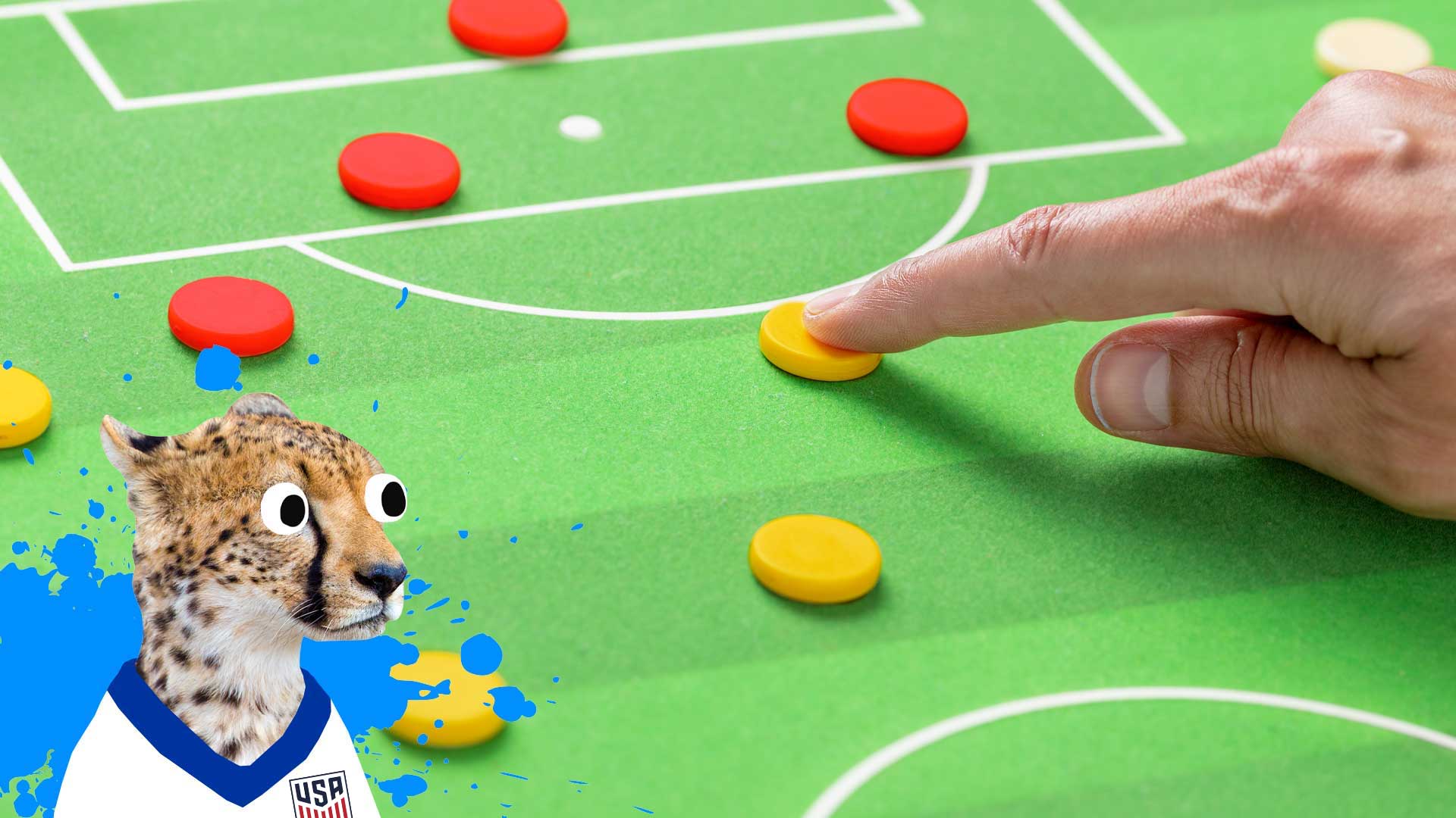 A USA football player looks at a tactics board