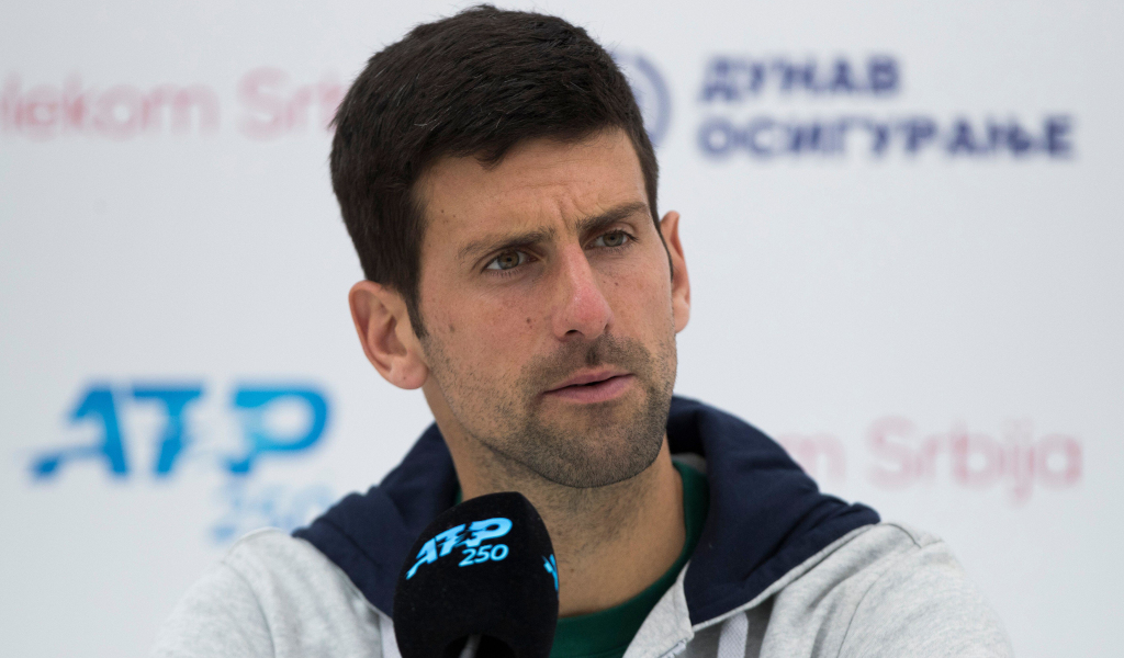 Novak Djokovic speaks to the media