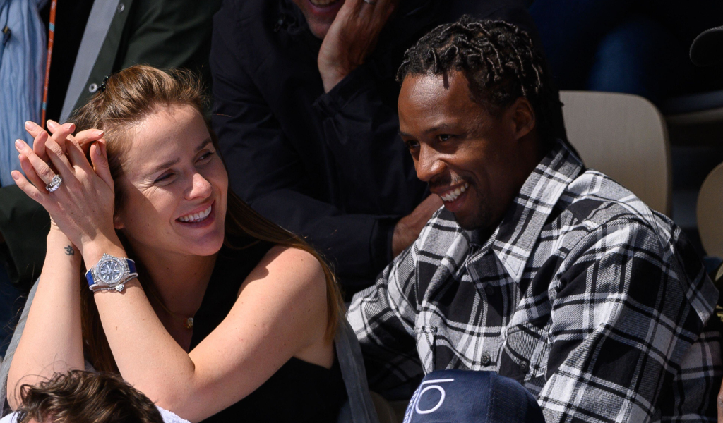 Elina Svitolina and Gael Monfils watch a match