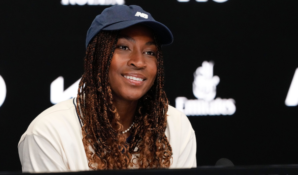 Coco Gauff talks to the media